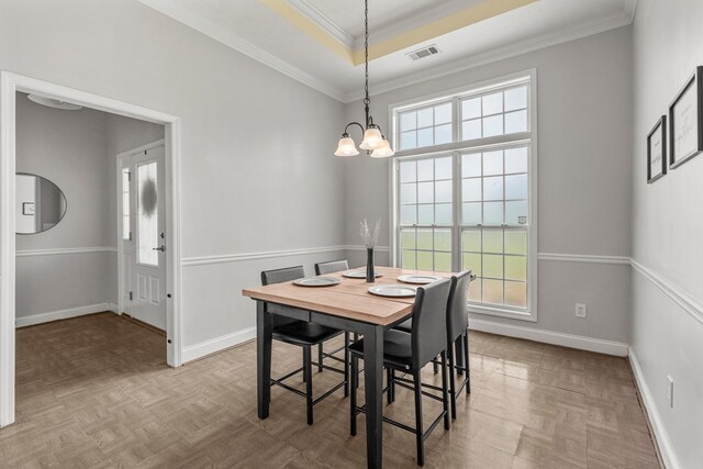 176 Lee Road 0504, Phenix City, AL 36870 - dining room featuring a chandelier, healthy amount of natural light, and crown molding