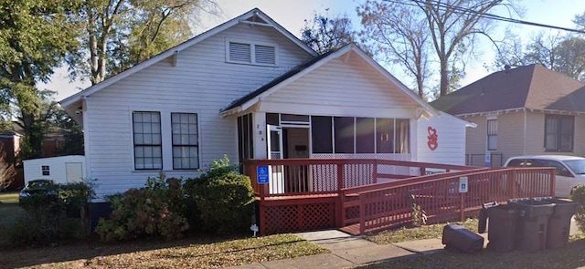 206 E Oak St, Tuskegee, AL 36083 - bungalow featuring a deck and a sunroom