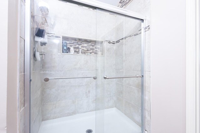 bathroom with walk in shower