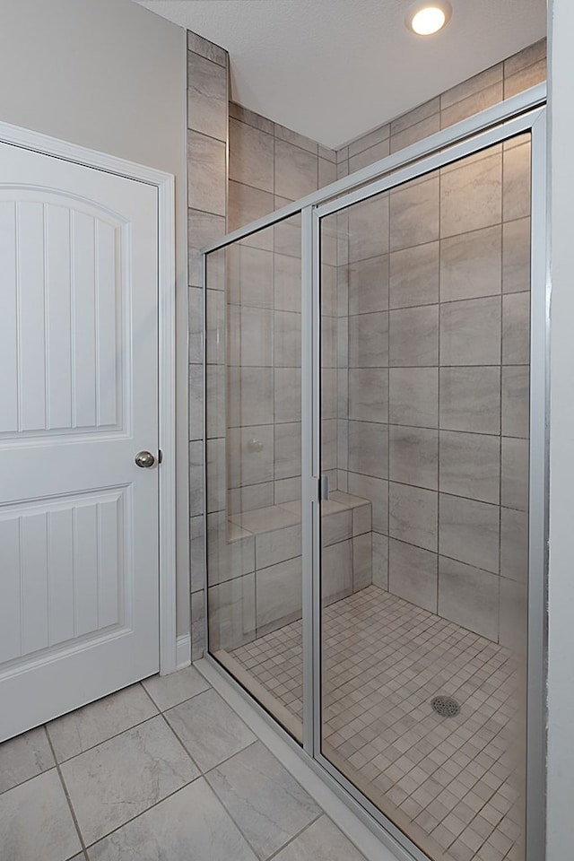 bathroom featuring walk in shower