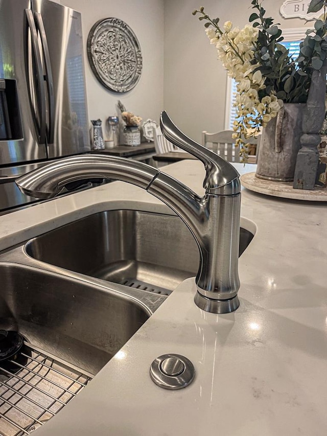 interior details featuring stainless steel refrigerator