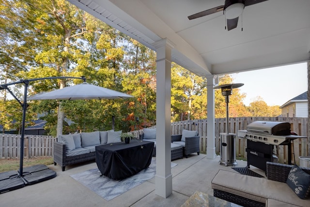 view of patio / terrace featuring outdoor lounge area, ceiling fan, and grilling area