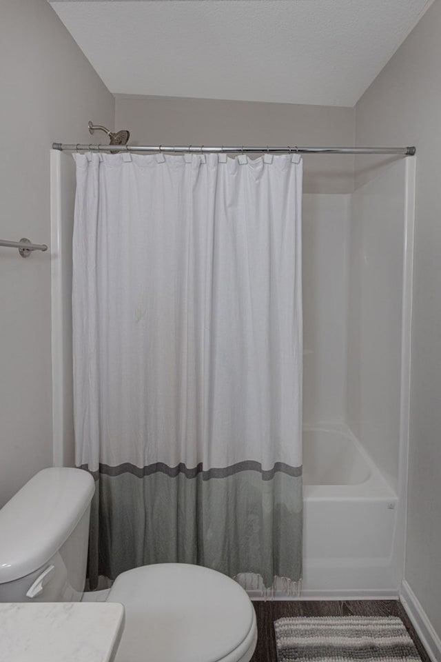 full bathroom featuring vanity, toilet, and shower / bathtub combination with curtain