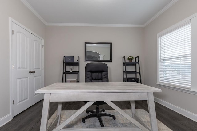 home office with dark wood-type flooring, a wealth of natural light, and ornamental molding