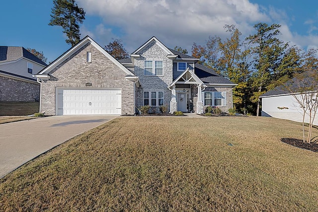 view of front of house featuring a garage and a front yard