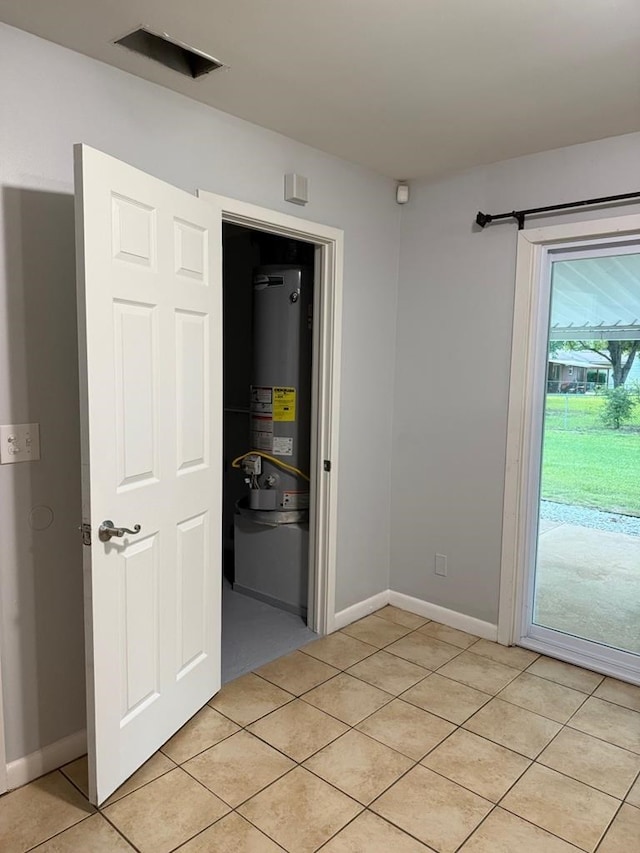 4229 Empire St, Columbus, GA 31907 - unfurnished room featuring water heater and light tile patterned flooring