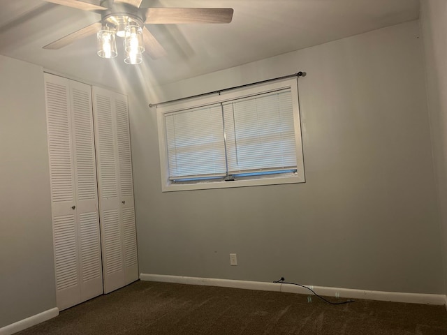 4229 Empire St, Columbus, GA 31907 - unfurnished bedroom featuring dark carpet, a closet, and ceiling fan