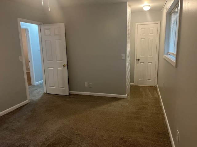 4229 Empire St, Columbus, GA 31907 - spare room with dark colored carpet and baseboards