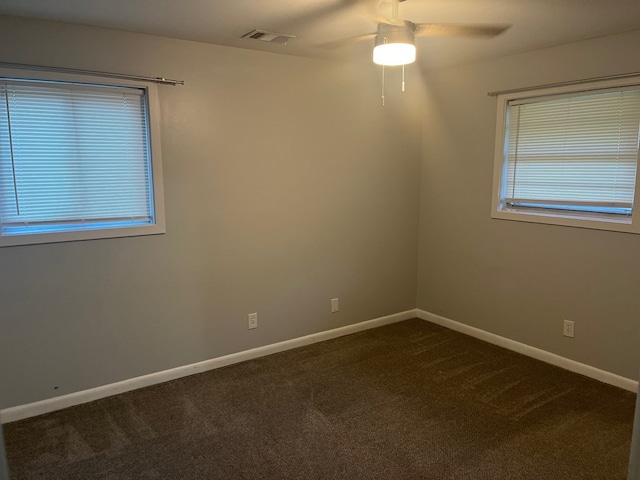 4229 Empire St, Columbus, GA 31907 - empty room featuring a ceiling fan and dark carpet