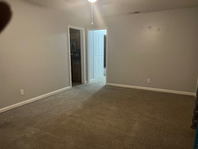 4229 Empire St, Columbus, GA 31907 - carpeted empty room with baseboards and ceiling fan