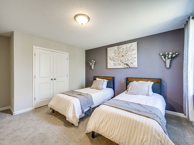 13733 Macon Rd, Upatoi, GA 31829 - carpeted bedroom featuring a closet and baseboards