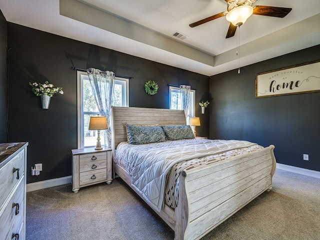 13733 Macon Rd, Upatoi, GA 31829 - bedroom with carpet flooring, a raised ceiling, and ceiling fan