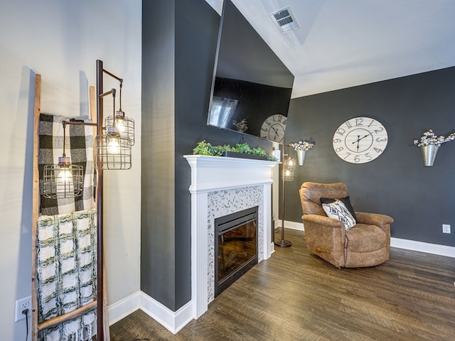 13733 Macon Rd, Upatoi, GA 31829 - sitting room with wood finished floors and a tiled fireplace