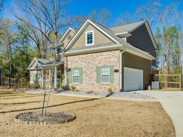 13733 Macon Rd, Upatoi, GA 31829 - view of front of property featuring brick siding, an attached garage, and concrete driveway