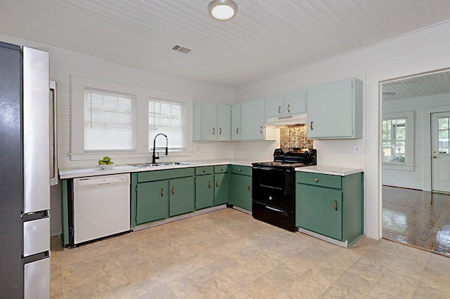 2000 Elgin Dr, Columbus, GA 31906 - kitchen featuring dishwasher, a sink, black electric range, under cabinet range hood, and green cabinets