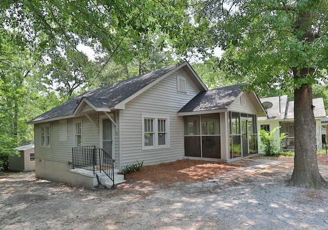 2000 Elgin Dr, Columbus, GA 31906 - view of front of house with a sunroom and roof with shingles