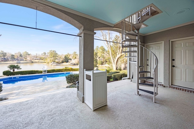 view of patio with an outdoor pool, stairs, and a water view