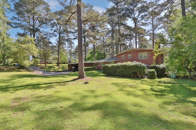 2951 Florence Dr, Columbus, GA 31907 - view of grassy yard featuring view of wooded area