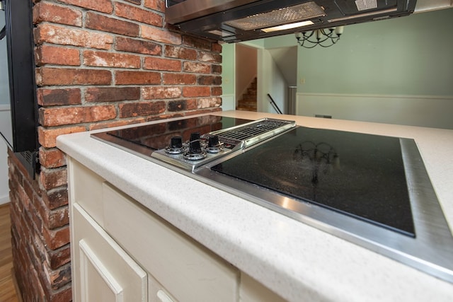 2951 Florence Dr, Columbus, GA 31907 - detailed view of extractor fan and stovetop with downdraft