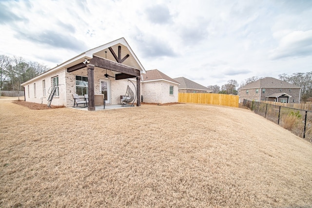 back of property with a patio area