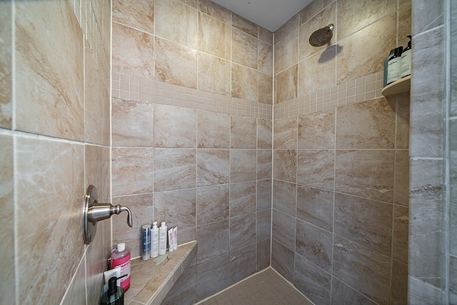 bathroom featuring tiled shower