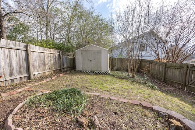 view of yard featuring a storage unit