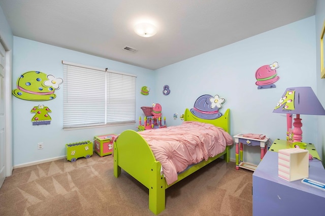 carpeted bedroom featuring a textured ceiling