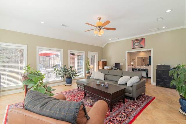 living area with visible vents, recessed lighting, and ornamental molding