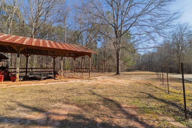 view of yard featuring a wooded view