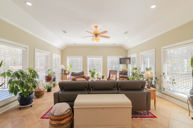 living area with recessed lighting, visible vents, a healthy amount of sunlight, and vaulted ceiling