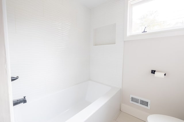 full bath featuring a bathtub, a shower, visible vents, and toilet