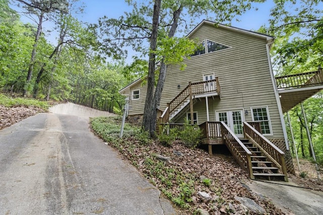 15635 US Highway 0027, Hamilton, GA 31811 - exterior space featuring stairway, driveway, and a deck