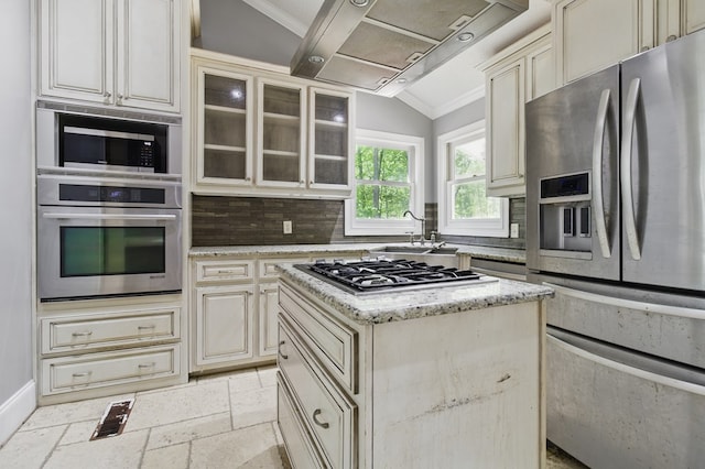 15635 US Highway 0027, Hamilton, GA 31811 - kitchen featuring a sink, backsplash, light stone counters, appliances with stainless steel finishes, and cream cabinets