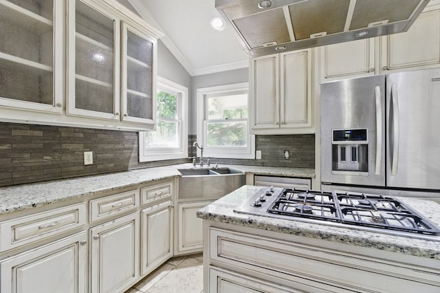 15635 US Highway 0027, Hamilton, GA 31811 - kitchen with vaulted ceiling, ornamental molding, tasteful backsplash, appliances with stainless steel finishes, and cream cabinets