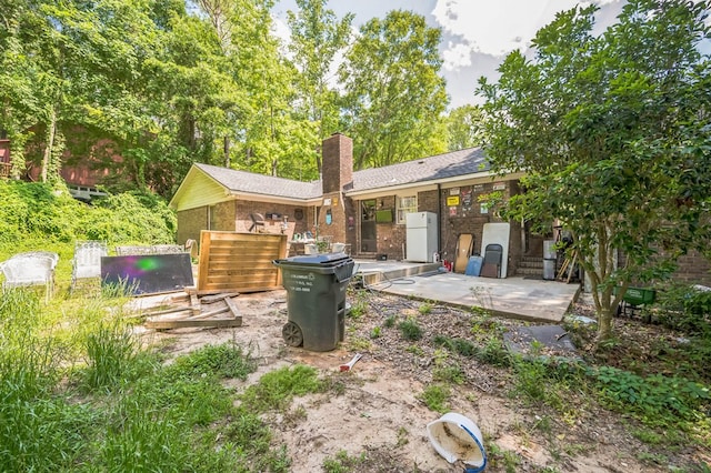 1037 Rockybrook Ct, Columbus, GA 31904 - rear view of house featuring a chimney, a patio, and brick siding