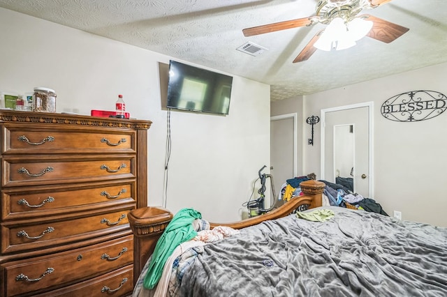 1037 Rockybrook Ct, Columbus, GA 31904 - bedroom featuring a textured ceiling and ceiling fan