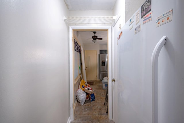 1037 Rockybrook Ct, Columbus, GA 31904 - hallway with stone finish floors, baseboards, and arched walkways