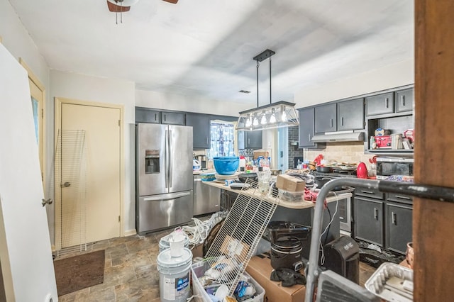 1037 Rockybrook Ct, Columbus, GA 31904 - kitchen with stainless steel refrigerator with ice dispenser, decorative backsplash, dark countertops, dark stone finish flooring, and under cabinet range hood