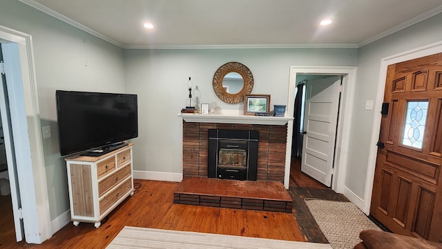 4232 Almond Rd, Fortson, GA 31808 - living room with crown molding, baseboards, wood finished floors, a fireplace, and recessed lighting