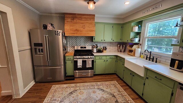 4232 Almond Rd, Fortson, GA 31808 - kitchen featuring appliances with stainless steel finishes, a sink, crown molding, and light countertops