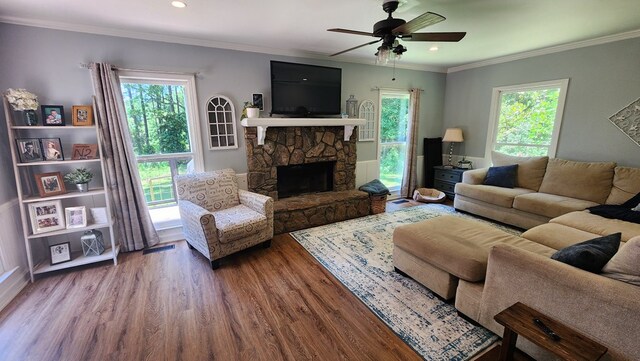4232 Almond Rd, Fortson, GA 31808 - living area with wood finished floors, a ceiling fan, plenty of natural light, a fireplace, and recessed lighting