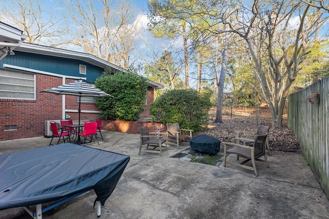 view of patio / terrace featuring outdoor dining space and a fenced backyard