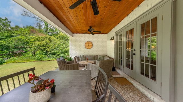 view of patio with a ceiling fan and french doors