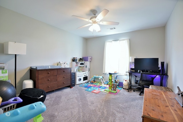 interior space featuring carpet flooring and ceiling fan