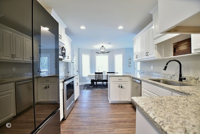 kitchen featuring sink and white cabinetry