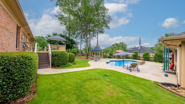 6359 Cape Cod Dr, Columbus, GA 31904 - view of swimming pool with stairs, a patio, a wooden deck, a gazebo, and a fenced backyard