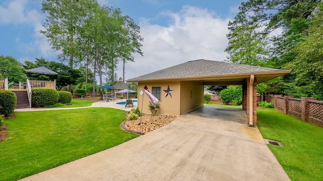 6359 Cape Cod Dr, Columbus, GA 31904 - view of property's community with driveway, a swimming pool, and a carport