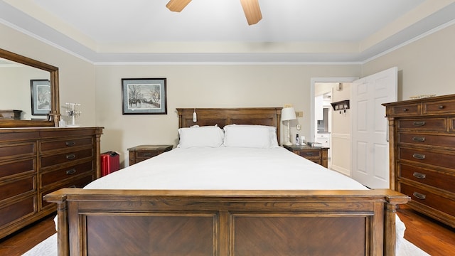 6359 Cape Cod Dr, Columbus, GA 31904 - bedroom with dark wood finished floors, a raised ceiling, and ceiling fan
