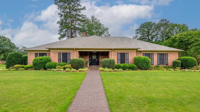 6359 Cape Cod Dr, Columbus, GA 31904 - ranch-style home with a front yard, brick siding, a chimney, and a shingled roof