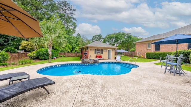 6359 Cape Cod Dr, Columbus, GA 31904 - view of swimming pool featuring an exterior structure, an outdoor structure, and a patio